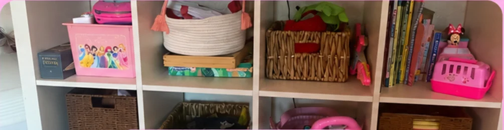Low cube shelves with baskets, books and learning toys